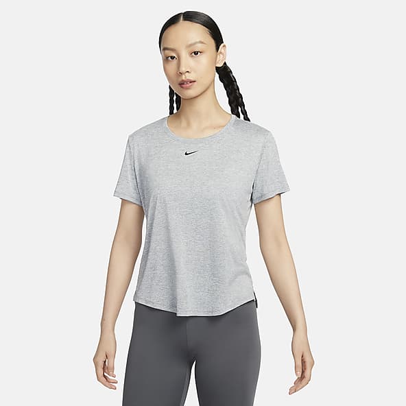 Grey Dri-FIT Yoga Tops. Nike IN