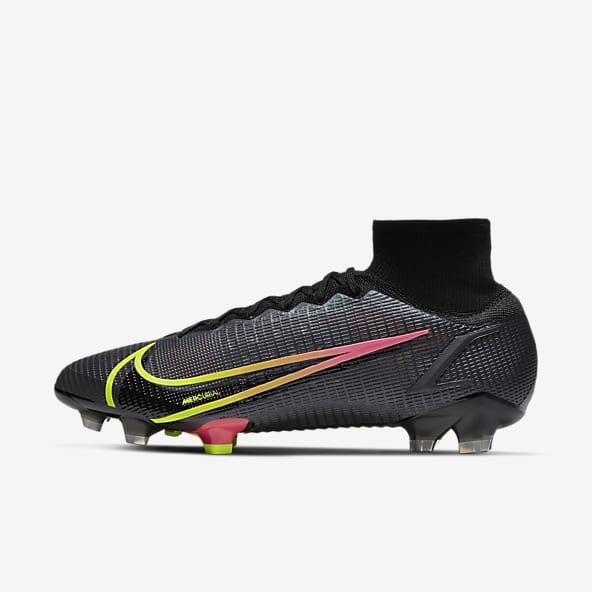 black and yellow nike boots