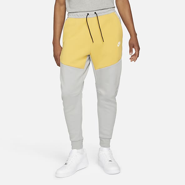 orange nike tech sweatsuit