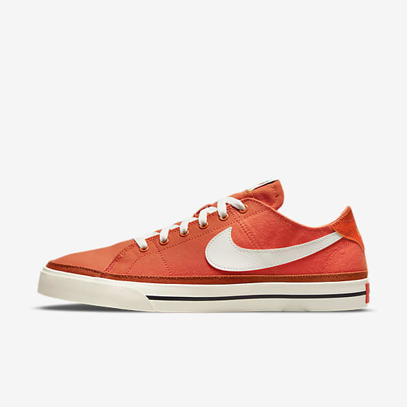 red orange nike shoes