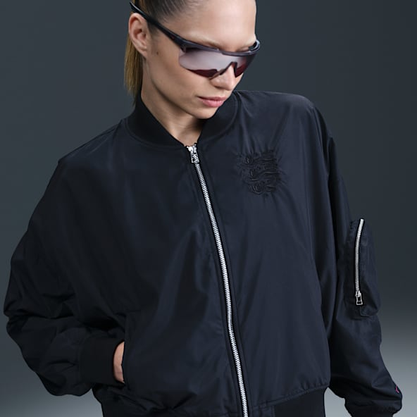 Inglaterra Essential Chaqueta bomber de fútbol oversize Nike - Mujer