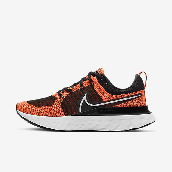 grey and orange nike shoes