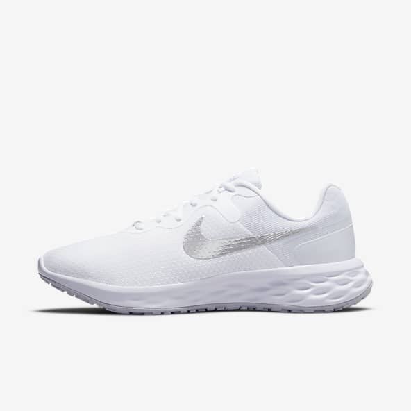 white and pink nike runners