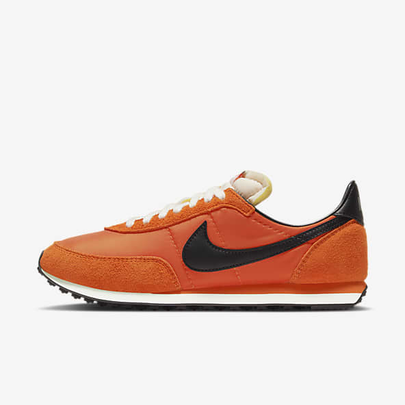 women orange nike shoes