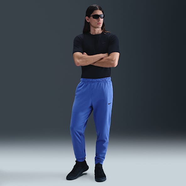 Nike Therma Męskie zwężane spodnie do fitnessu Therma-FIT