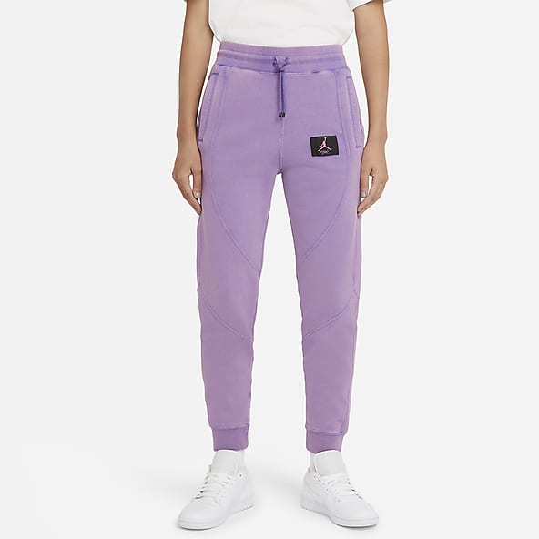 purple nike track pants