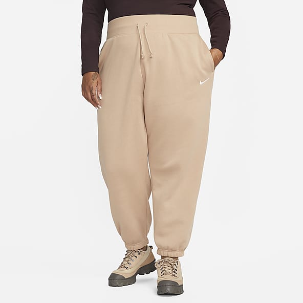 Pantaloni tuta oversize a vita alta Nike Sportswear Phoenix Fleece (Plus  size) – Donna