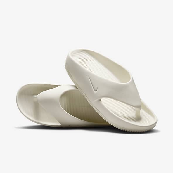 Buy nike slippers at 50 off online