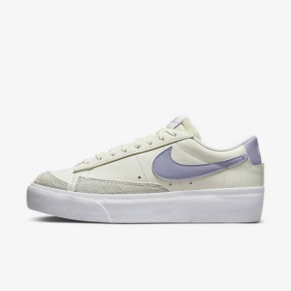 nike blazer low dorados