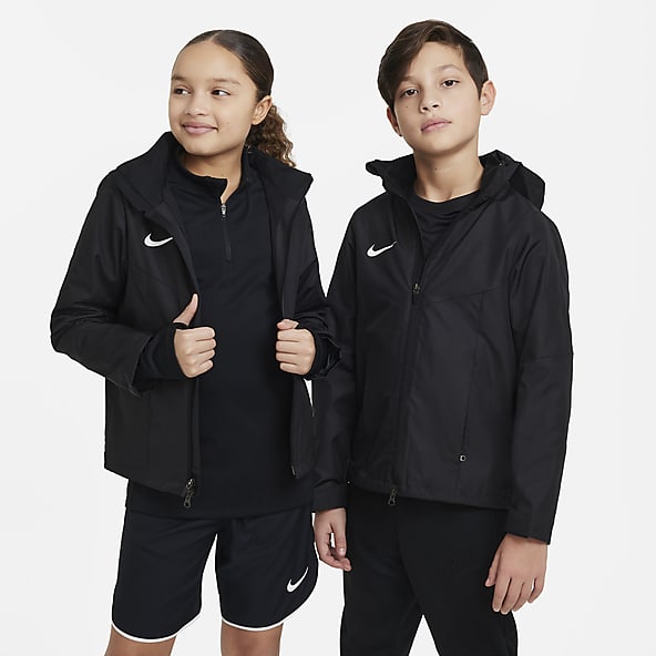 base famélico datos Chaquetas y abrigos negros para niño. Nike ES