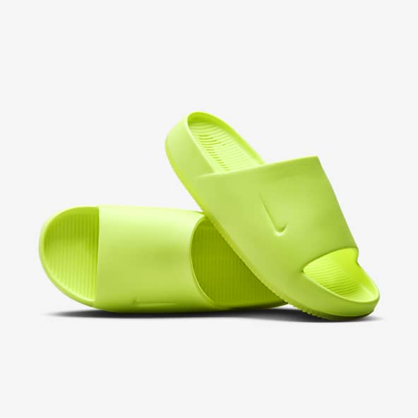 Women s 0 50 Yellow Slides. Nike IE