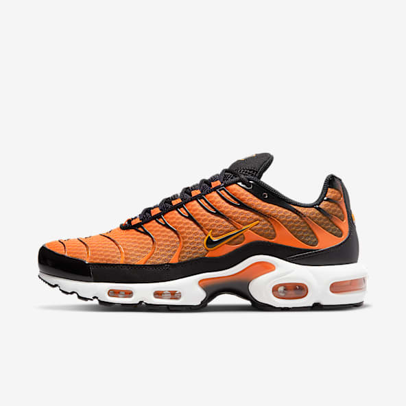 nike orange white and black shoes