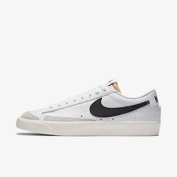 Zapatillas de deporte blancas y azules con logo doble efecto spray Blazer  Low '77 de Nike