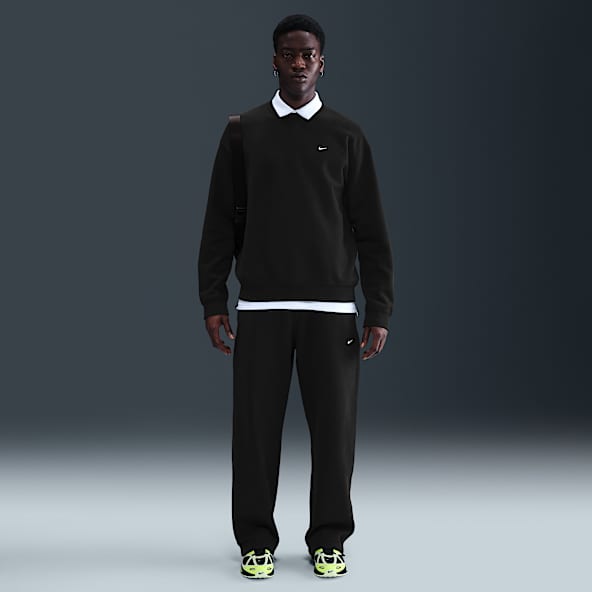 Nike Solo Swoosh Pantaloni in fleece con bordo aperto – Uomo