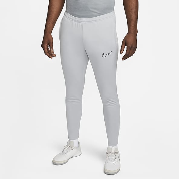 Hombre Gris Pantalones y mallas. Nike ES