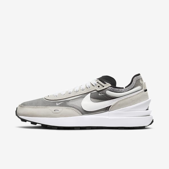 white and grey nike shoes