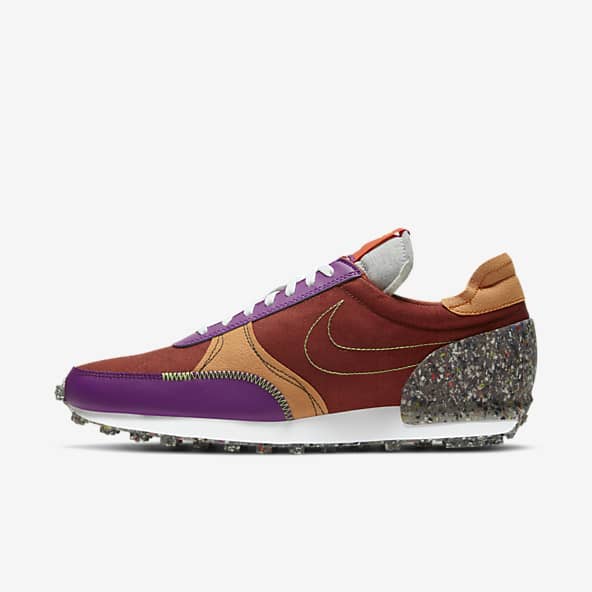 nike shoes with orange bottoms