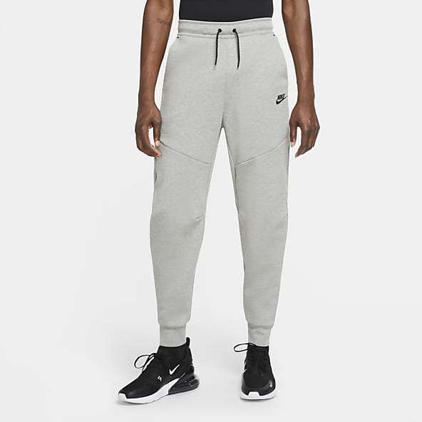 Joggers y pantalones de chándal Tech de color gris. Nike ES