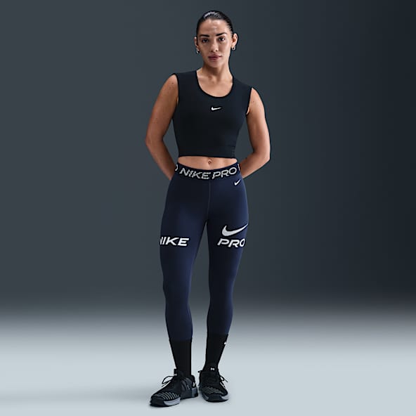 Nike Pro Leggings de 7/8 de talle medio con estampado y paneles de malla - Mujer
