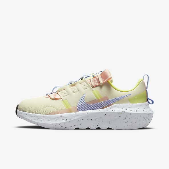 pink and yellow nike shoes