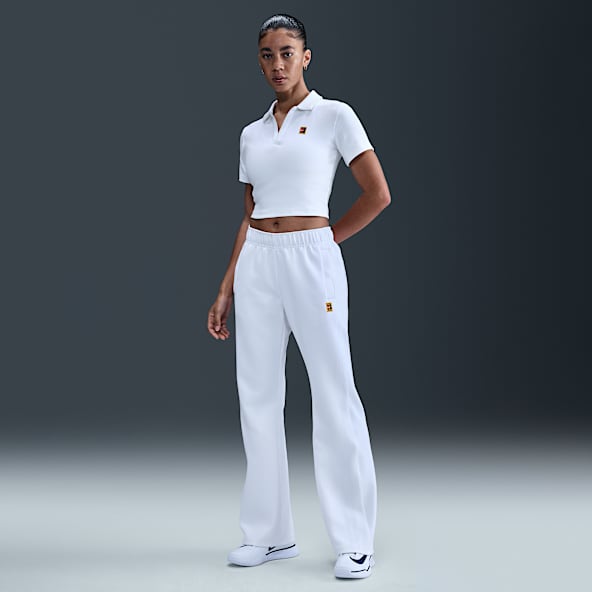 NikeCourt Heritage Windrunner Pants de tenis de tiro medio para mujer