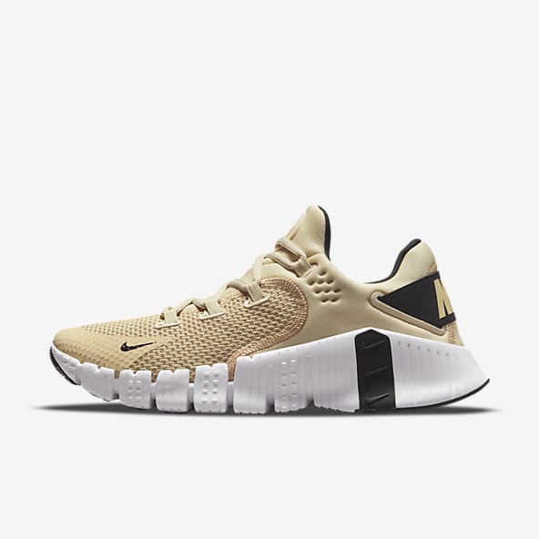 Nike free hombre dorados clearance