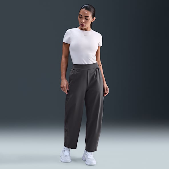 Nike 24.7 PerfectStretch Damskie luźne spodnie z wysokim stanem i szerokimi nogawkami Dri-FIT