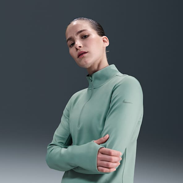 Nike One Prenda intermedia Therma-FIT de medio cierre para mujer