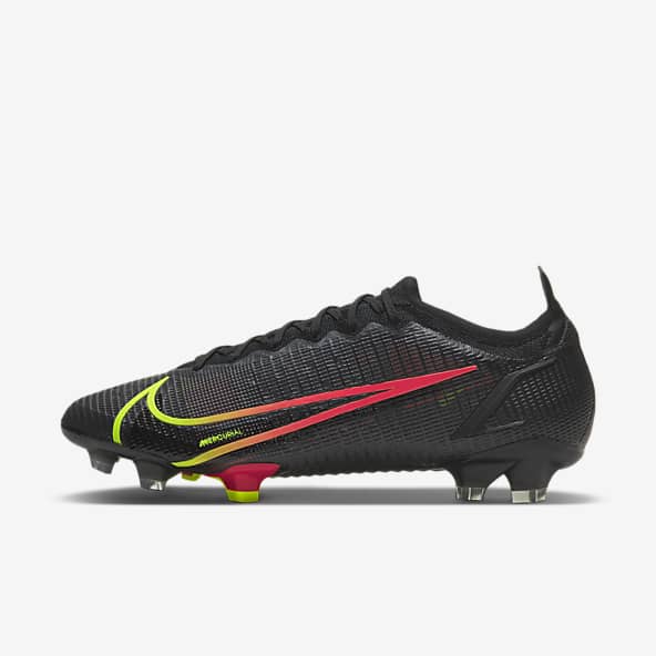 black nike football boots with gold tick