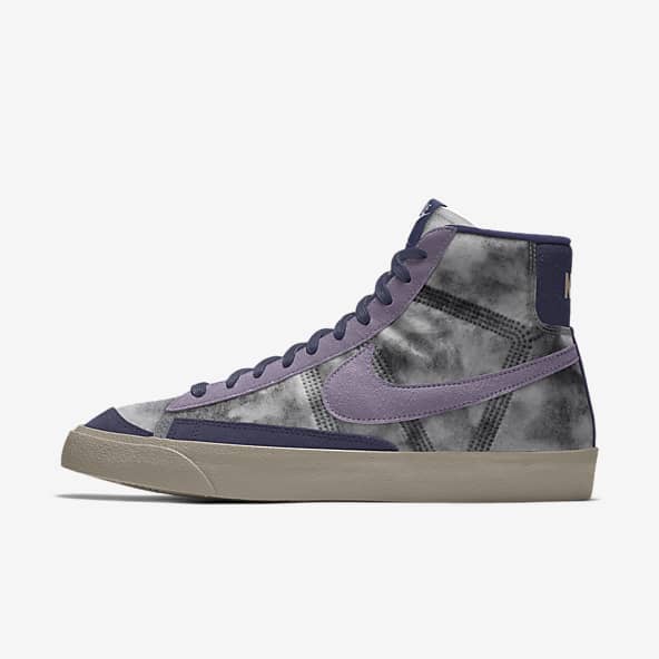 purple and grey nike shoes