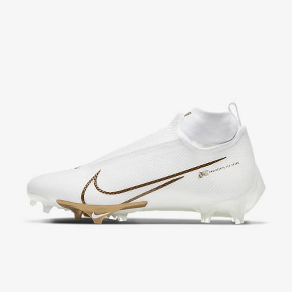 white and gold nike football cleats