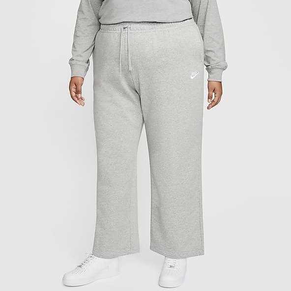 Nike Sportswear Club Fleece Pants de entrenamiento de tiro medio de pierna ancha para mujer (talla grande)