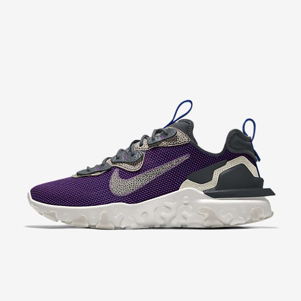 white and purple nike shoes