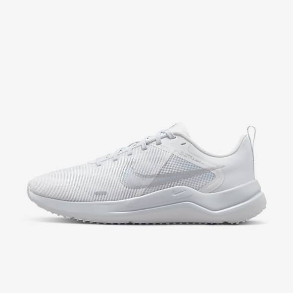 Tenis nike running blancos sales