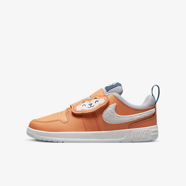 Zapatillas naranjas. Nike