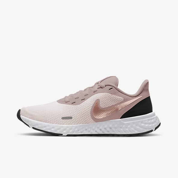 pink white nike shoes