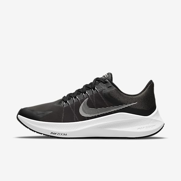 all white nike walking shoes