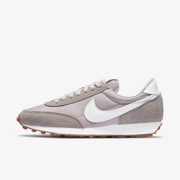 grey and white nike shoes