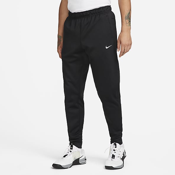 Pantalón de fitness tipo jogger cálido negro para hombre 100