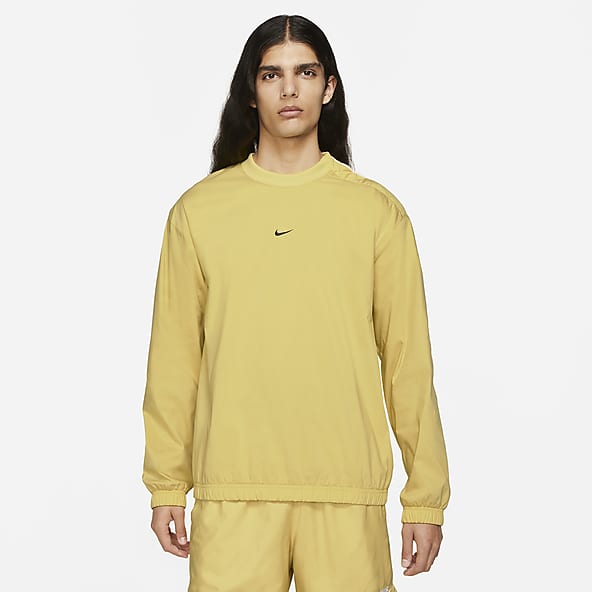 black nike shirt with yellow swoosh