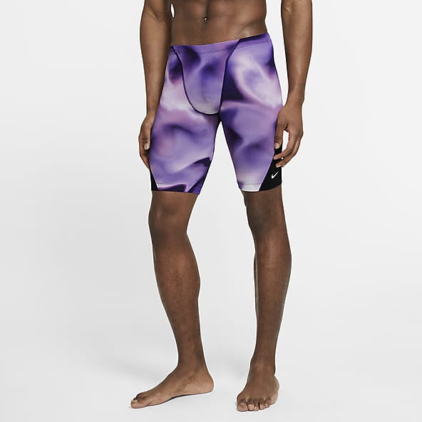 purple nike swim trunks