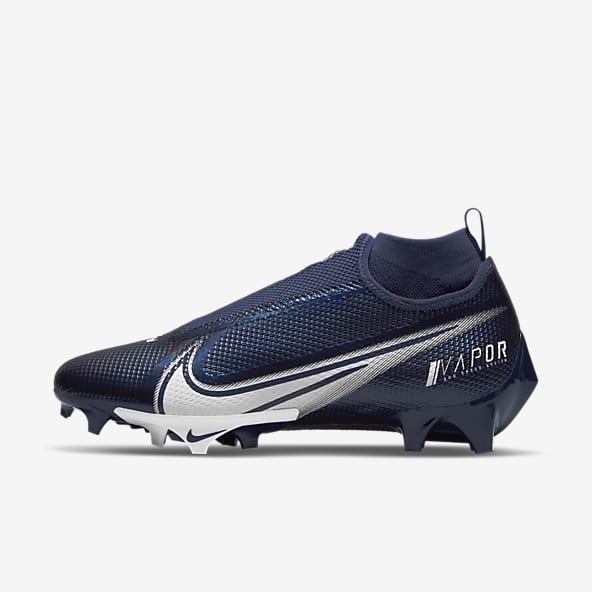 white and blue nike cleats