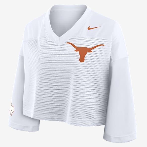 Texas Jersey Playera universitaria Nike Dri-FIT cropped para mujer