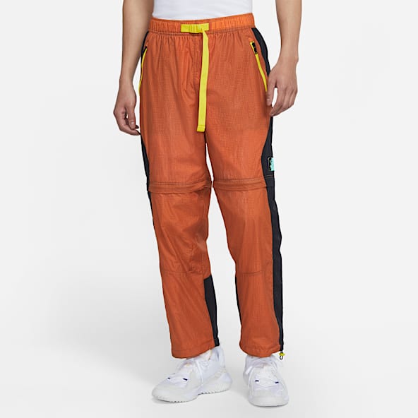 orange nike track pants