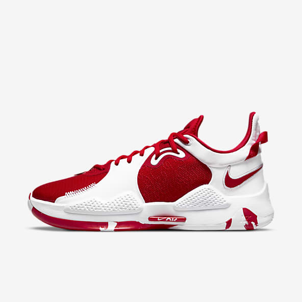 white and red nike shoes