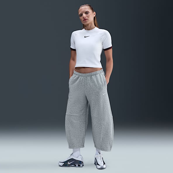 Nike Sportswear Phoenix Fleece Pantalones entubados de tiro medio holgados para mujer