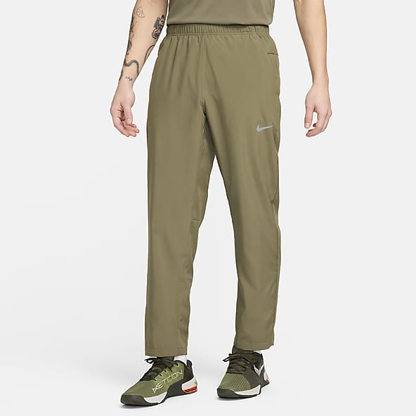Nike Sportswear Men's Unlined Cuff Trousers. Nike IN