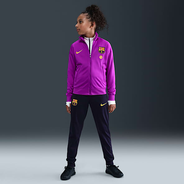 FC Barcelona Strike Dzianinowy dres piłkarski dla dużych dzieci Nike Dri-FIT