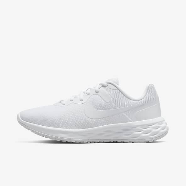 running white nike shoes