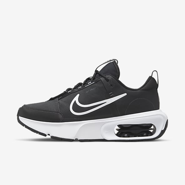 Tenis negros nike dama top